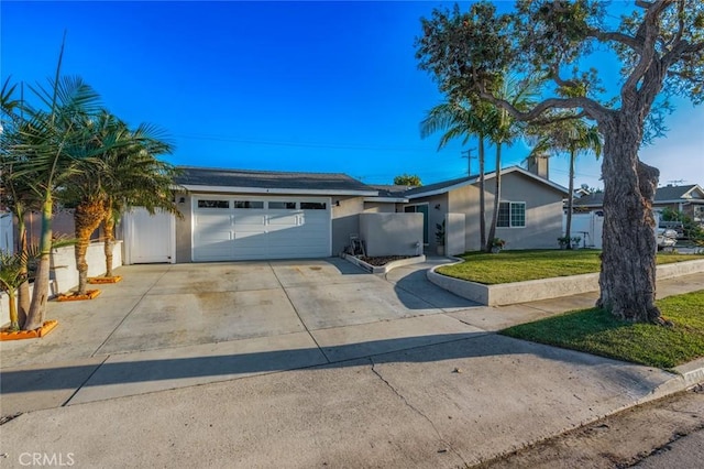 3140 Sumatra Pl, Costa Mesa, CA 92626 - ranch-style home featuring an attached garage, concrete driveway, and stucco siding