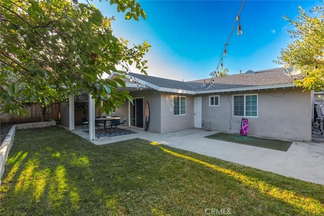 3140 Sumatra Pl, Costa Mesa, CA 92626 - rear view of property with stucco siding and a patio area