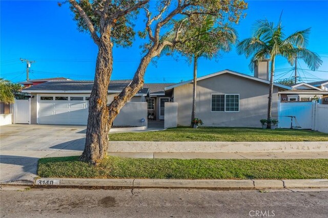3140 Sumatra Pl, Costa Mesa, CA 92626 - ranch-style house with concrete driveway, a garage, and stucco siding