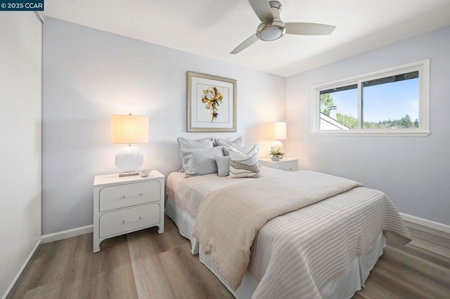 bedroom featuring wood-type flooring and ceiling fan