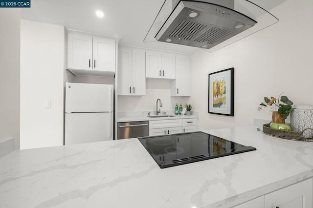 kitchen with sink, extractor fan, white refrigerator, stainless steel dishwasher, and black electric stovetop