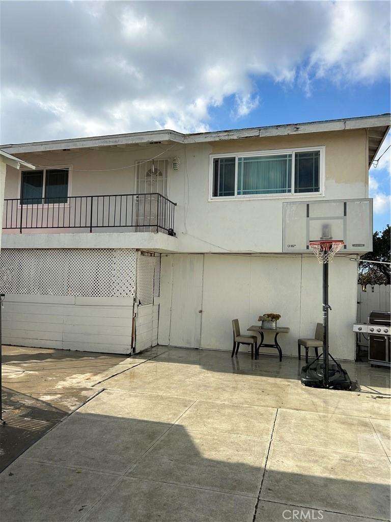 rear view of house featuring a patio