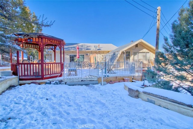 view of front of home featuring a gazebo