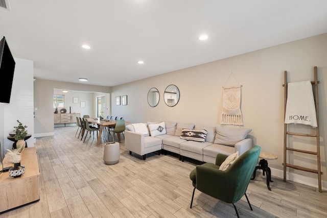 living room featuring light hardwood / wood-style flooring