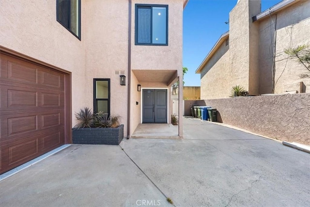 property entrance with a garage