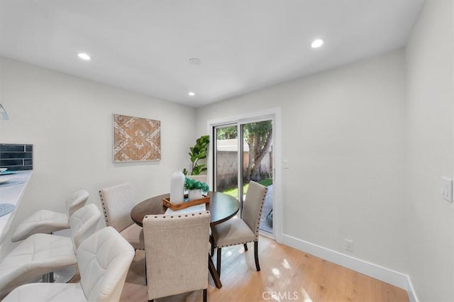 dining space featuring light hardwood / wood-style flooring