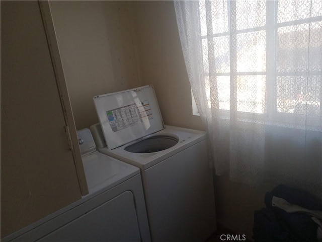 laundry area with washer and clothes dryer