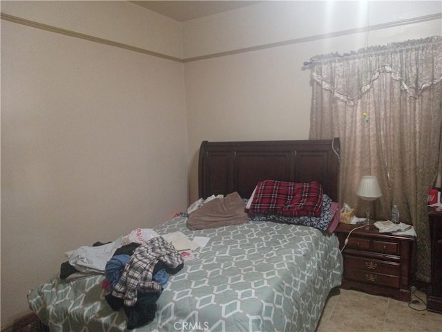 view of tiled bedroom