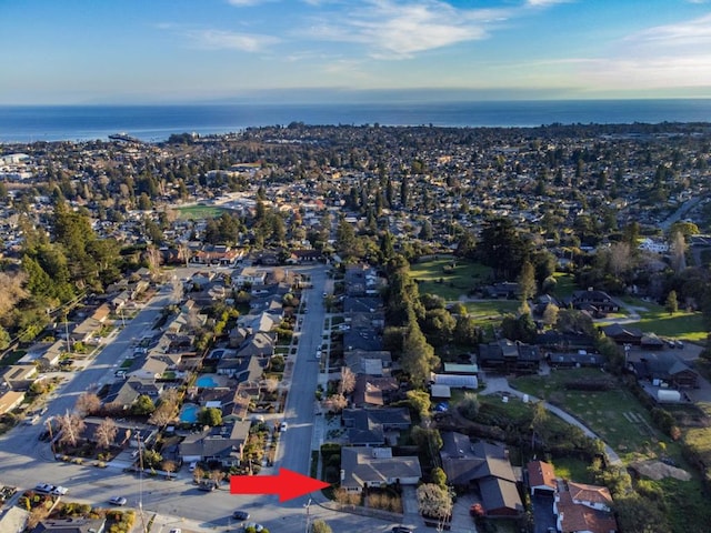 drone / aerial view featuring a water view