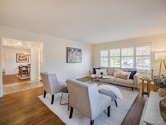 living room featuring hardwood / wood-style floors and a chandelier