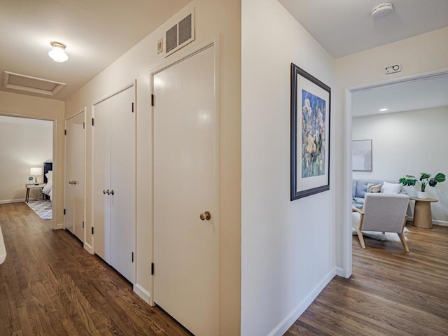 hall featuring dark hardwood / wood-style floors