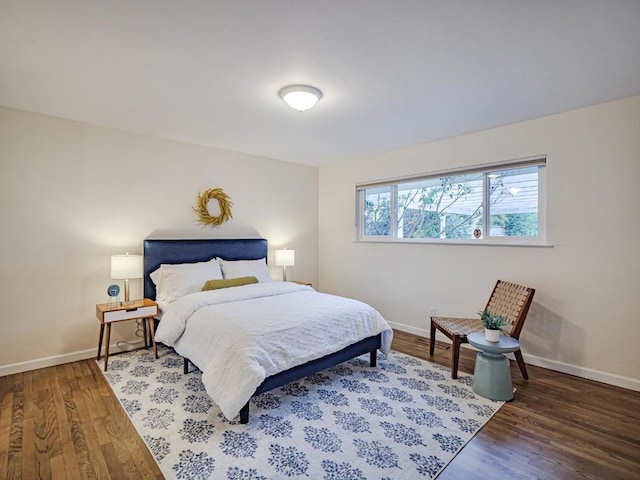 bedroom featuring dark wood-type flooring