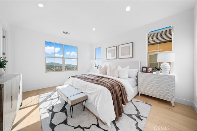 bedroom featuring light hardwood / wood-style flooring