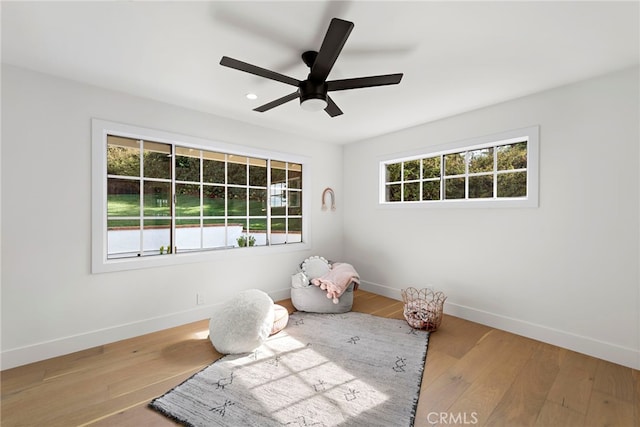 unfurnished bedroom featuring ceiling fan and light hardwood / wood-style floors