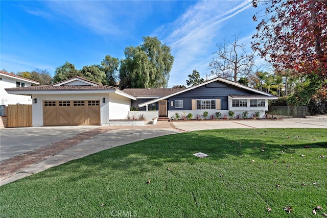 view of front facade featuring a garage and a front yard