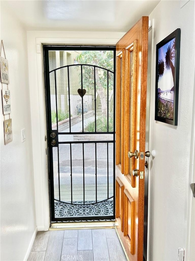 doorway featuring light hardwood / wood-style flooring