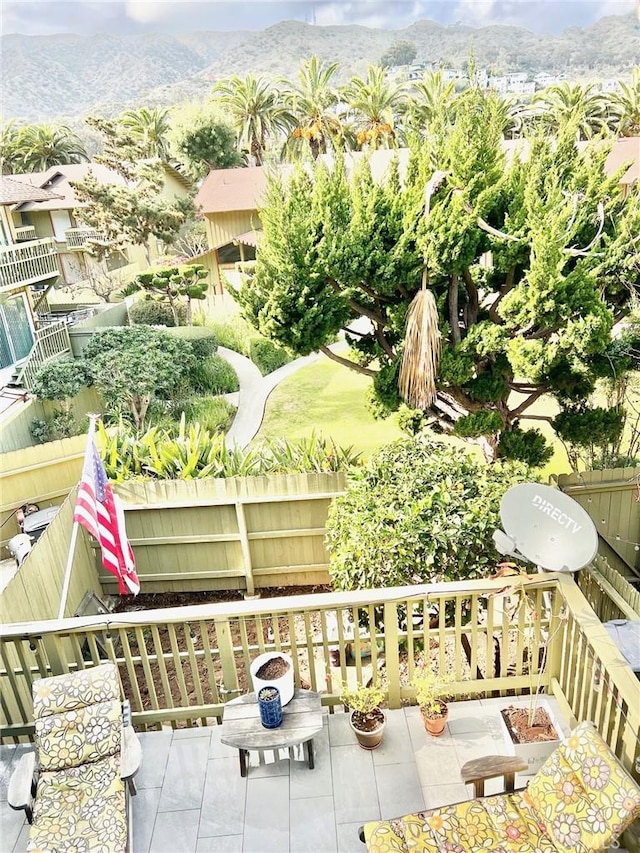 balcony featuring a mountain view