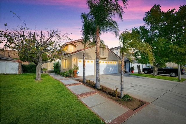 mediterranean / spanish-style house featuring a lawn