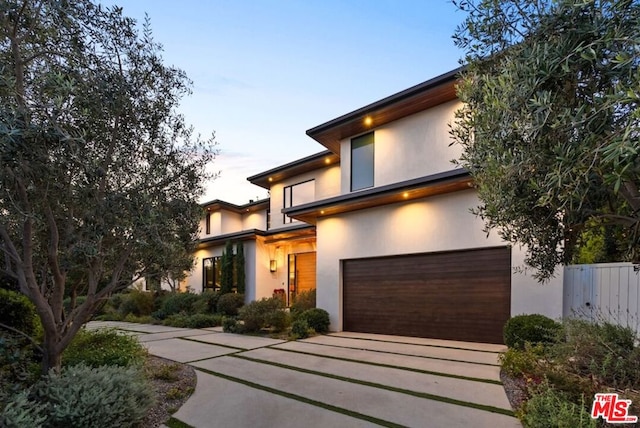 view of front of home with a garage