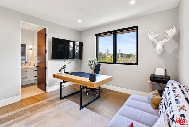 home office featuring light hardwood / wood-style flooring