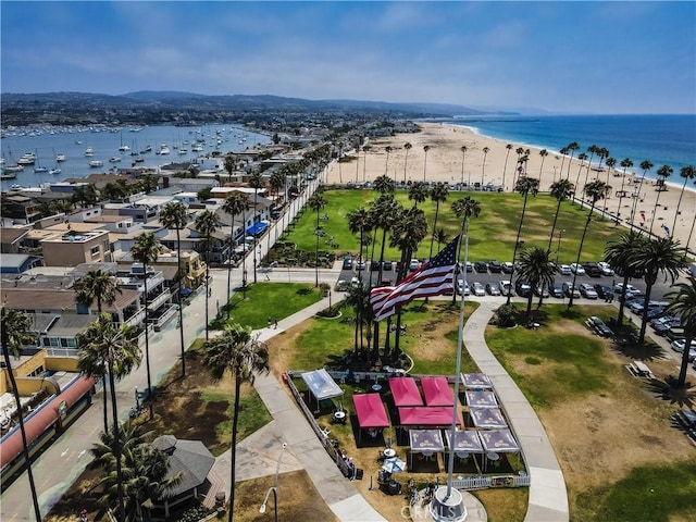 aerial view featuring a beach view and a water view