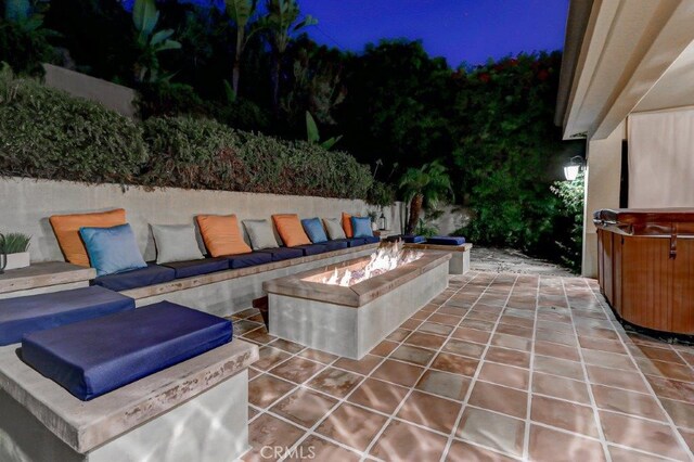 view of patio featuring a fire pit