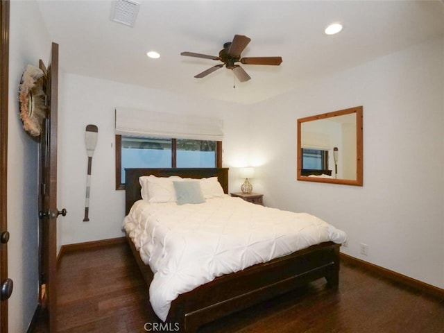 bedroom featuring dark wood-type flooring and ceiling fan