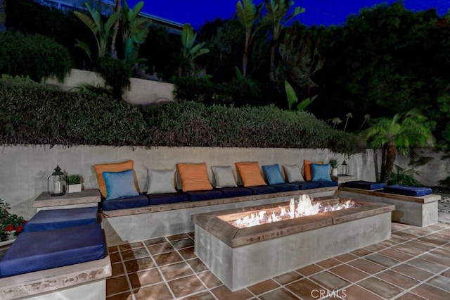 view of patio featuring an outdoor fire pit