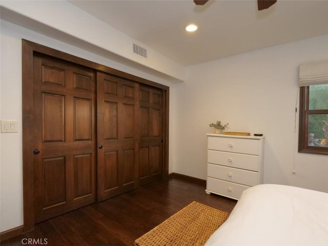 bedroom featuring dark wood-type flooring and ceiling fan