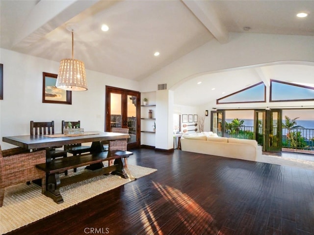 dining area with beam ceiling, hardwood / wood-style flooring, high vaulted ceiling, and french doors