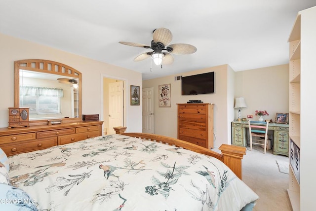 bedroom featuring ceiling fan and light colored carpet