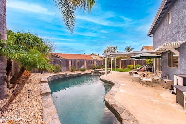 view of swimming pool featuring an in ground hot tub, a pergola, and a patio area