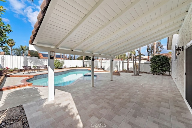 view of swimming pool with a patio