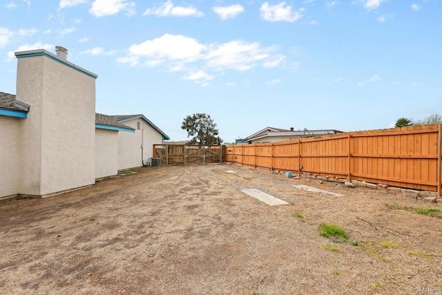 view of yard with central air condition unit