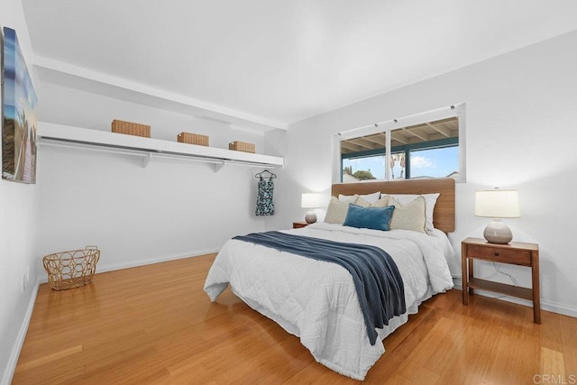 bedroom featuring wood-type flooring