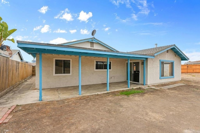 back of house featuring a patio