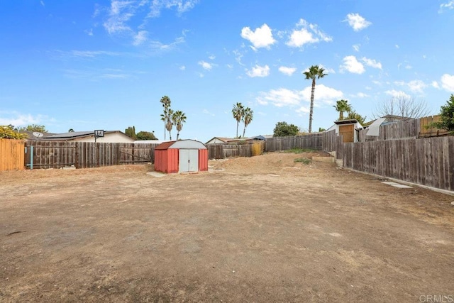 view of yard with a shed