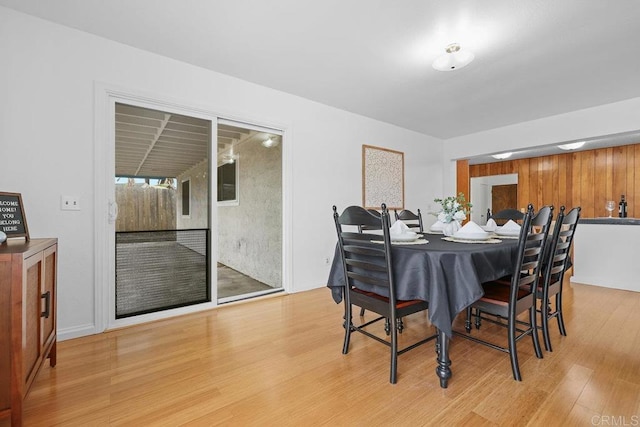 dining room with light hardwood / wood-style floors