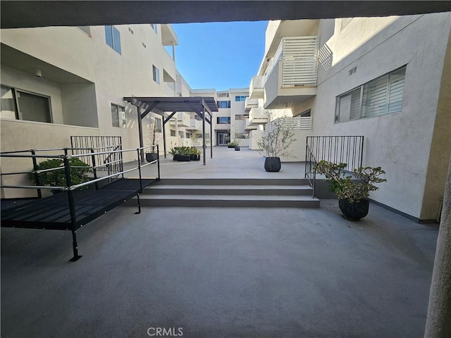 view of community featuring a pergola