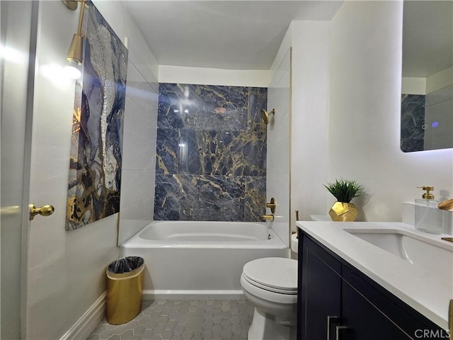 full bathroom with vanity, tile patterned flooring, toilet, and tiled shower / bath