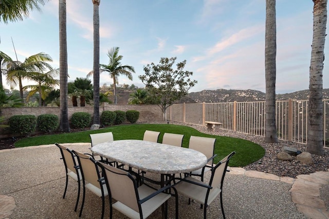 view of patio / terrace with a mountain view