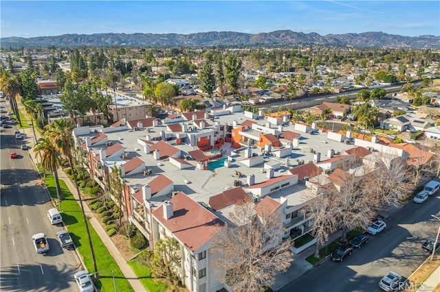 drone / aerial view featuring a mountain view