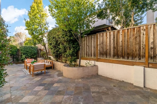 view of patio with an outdoor living space