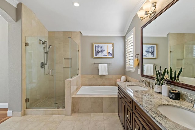 bathroom featuring independent shower and bath, crown molding, tile patterned flooring, and vanity