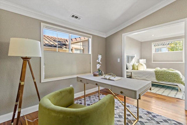 office area featuring ornamental molding and hardwood / wood-style floors