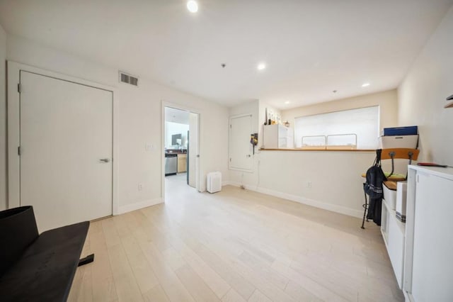 interior space with light hardwood / wood-style floors