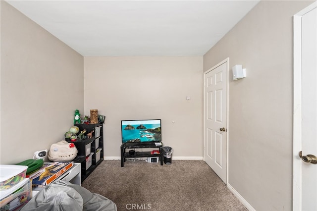 interior space with dark colored carpet