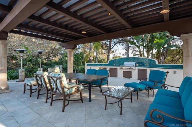 view of patio / terrace with exterior kitchen and grilling area