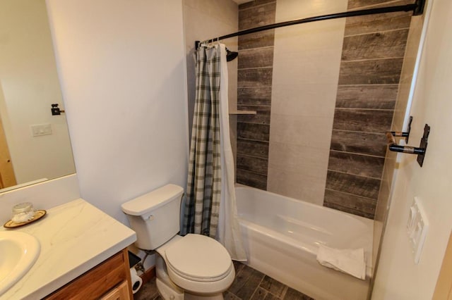 full bathroom with shower / tub combo with curtain, vanity, hardwood / wood-style floors, and toilet