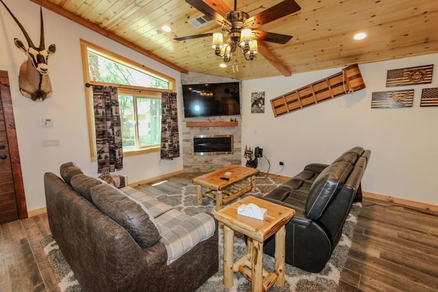 living room featuring hardwood / wood-style flooring, a stone fireplace, wooden ceiling, and ceiling fan